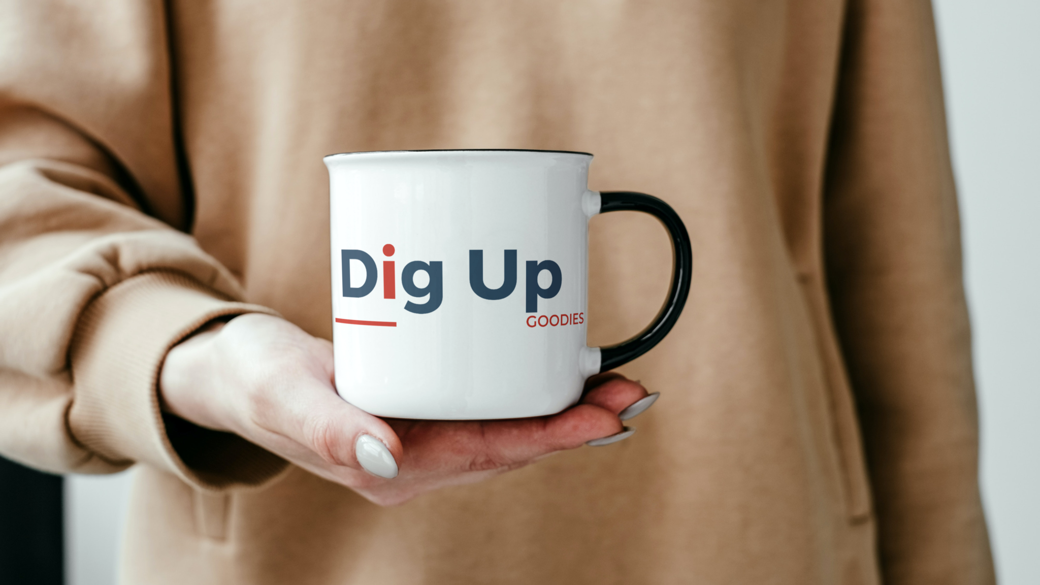 Enamel mug in the hand of a woman_Dig_Up-removebg-preview