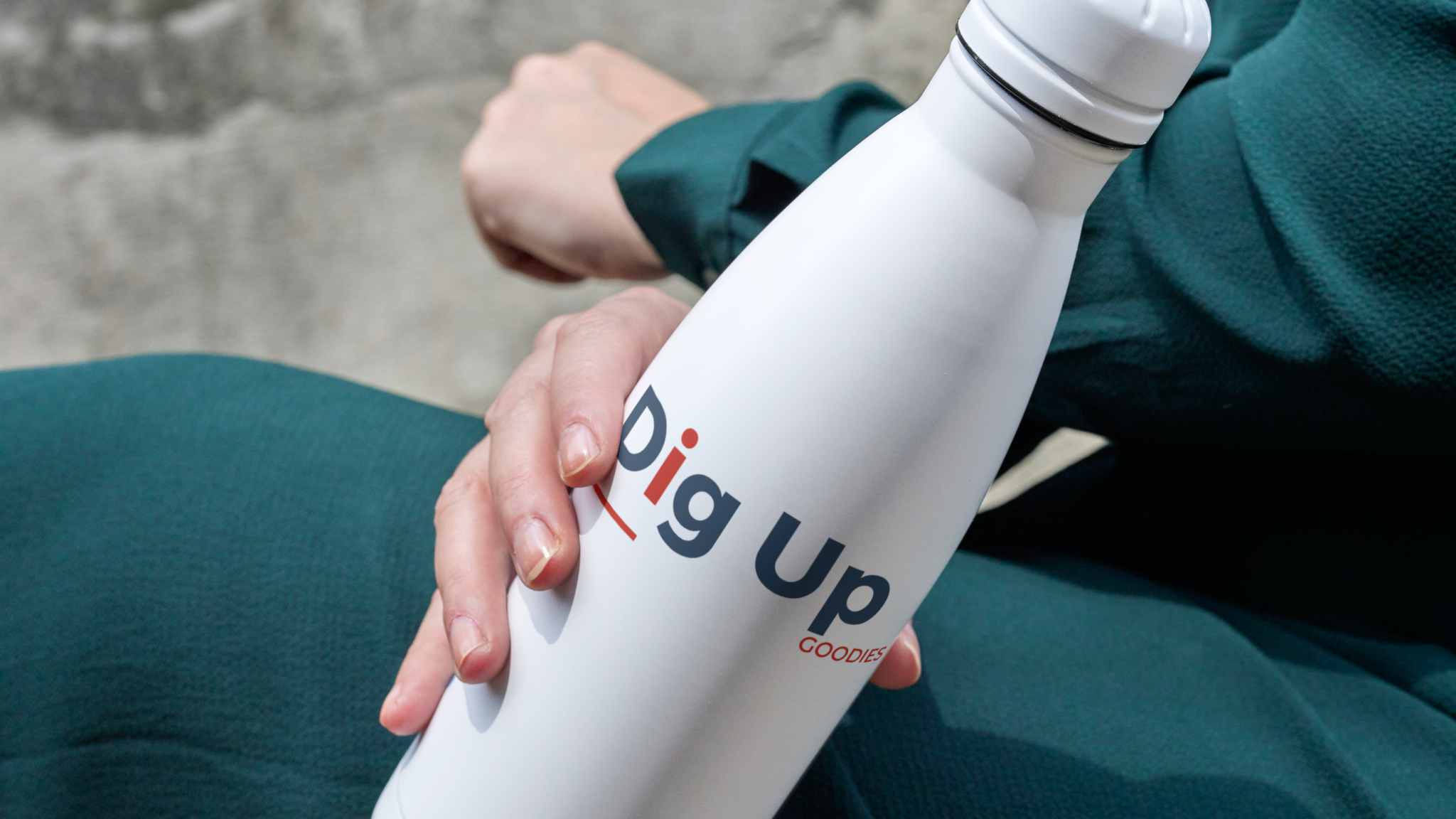 Water bottle in the hand of a woman_Dig_Up-removebg-preview